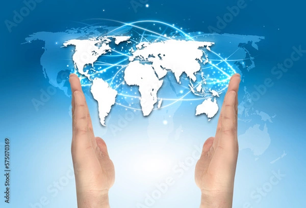 Obraz world map among the hands over a gradient blue background