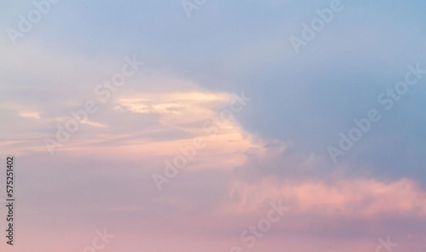 Fototapeta The vast Beautiful sky and four orange clouds that are beautiful sky before sunset. The natural sky before background has a breeze on a bright day in the summer.