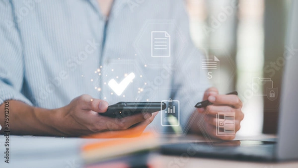 Fototapeta A man showing check mark icon,concepts of code of conduct, rules and policies, corporate governance documents; terms and conditions,Documents with check box items,Verification process for accuracy