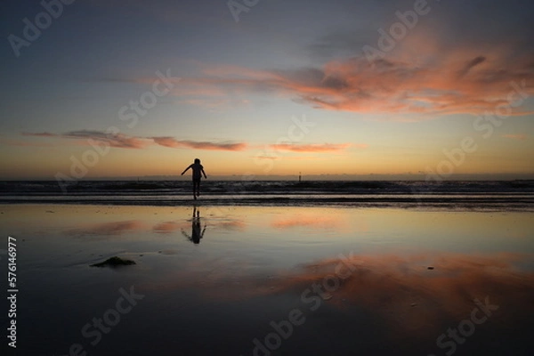 Obraz A boy jumping on the beach