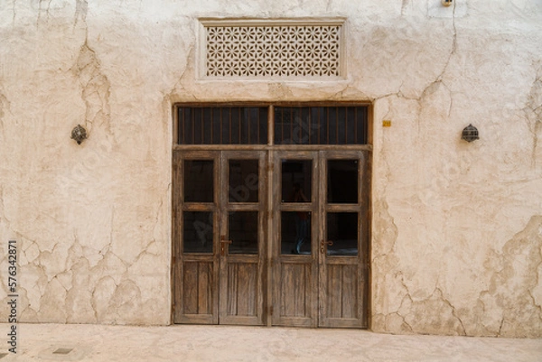 Obraz Dubai, UAE. Buildings and houses of traditional historical architecture of the old city of the Emirates in the Persian Gulf. The clay houses of Al Sifa.