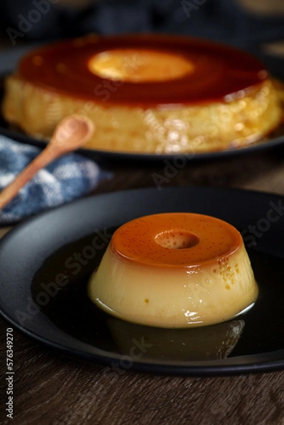 Obraz Milk pudding on a wooden table