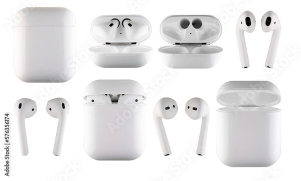 Fototapeta set of wireless headphones with a charging case on an isolated white background.