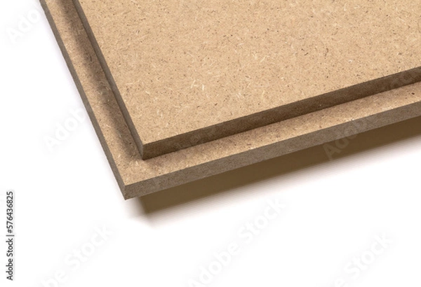 Fototapeta The raw mdf planks seem to float above the white surface.