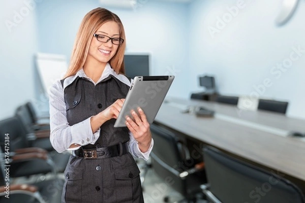 Obraz Young smart business woman worker with digital tablet