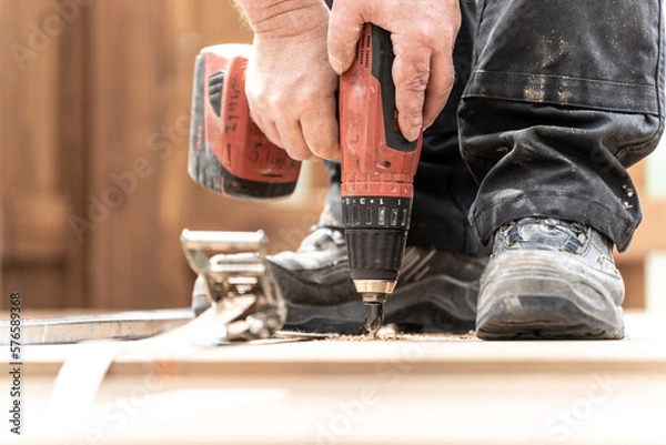 Obraz Handwerker baut Terrasse