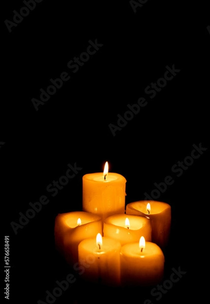 Fototapeta Set of candles on a black background with copy space. Holy Week, Good Friday, Pentecost, Religiosity and spirituality