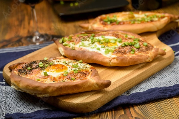 Obraz khachapuri - bread baked with cheese and egg