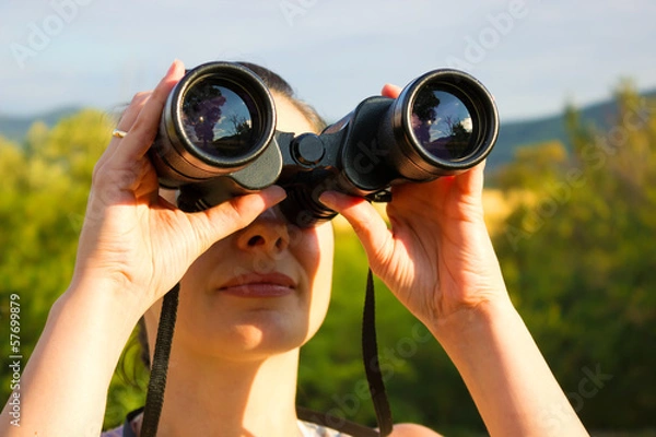 Obraz Woman with binoculars