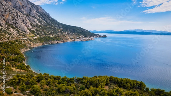 Fototapeta Enjoy the view of Croatia's beach from above, where turquoise waters meet soft sands. Relax and find adventure in this beautiful vacation spot, captured in stunning aerial photography.