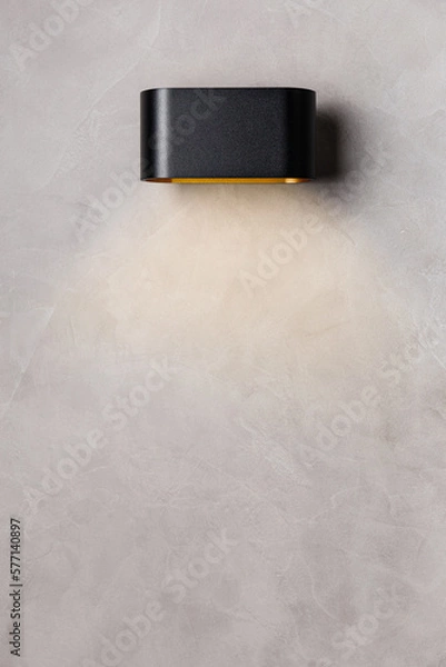 Obraz black wall lamp on gray wall copy space