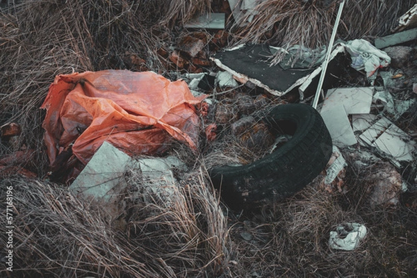 Obraz Waste and mess in the nature, recycling, earth day, hill full of waste