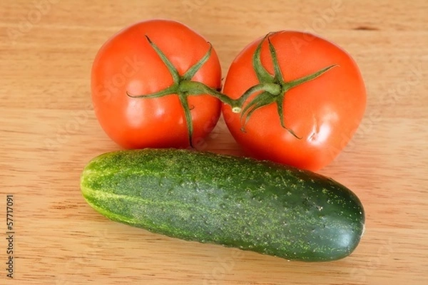 Obraz Two tomatoes and a cucumber