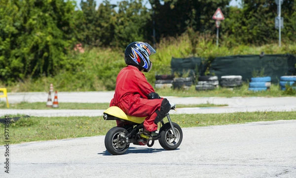 Obraz Young biker on minibike
