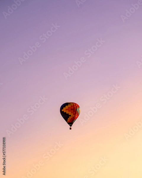 Fototapeta colorful hot air ballon at sunset
