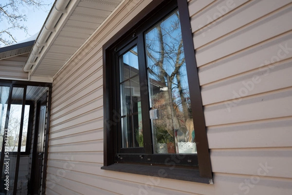 Obraz Window on wall decorated vinyl siding