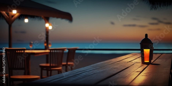 Fototapeta Plateau de table en bois, bar de plage avec fond flou de plage tropicale exotique. Table pour présentation de produits. Bannière de présentation d'un établissement de vacances, en bord de mer
