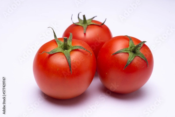 Obraz tomatoes on a white background