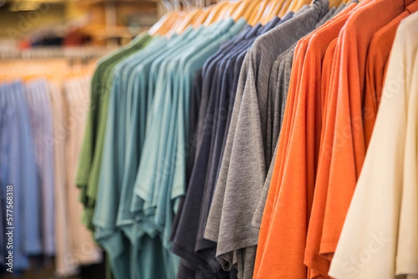 Fototapeta Different style of clothes displayed in a shop