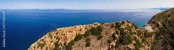 Fototapeta Aerial drone. Capo Calava bay and beach, with several holiday parks, resort and villages, near Gioiosa Marea, Sicily, Italy.