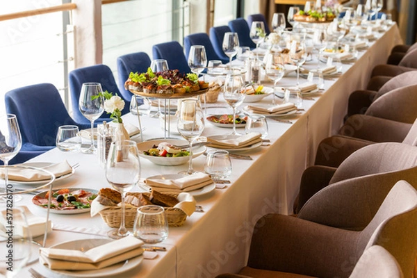Obraz served table in a restaurant for receiving guests