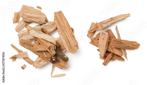 Obraz closeup of two piles of cedar or palo santo incense, wood chips isolated over a transparent background, top view / flat lay