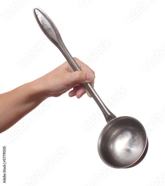 Obraz Hand holds a ladle (kitchen spoon), isolated on white background
