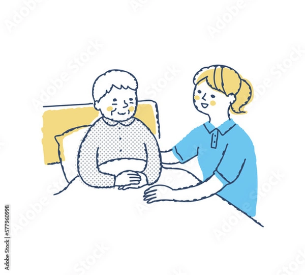 Obraz ベッドでくつろぐシニア女性と介護スタッフ