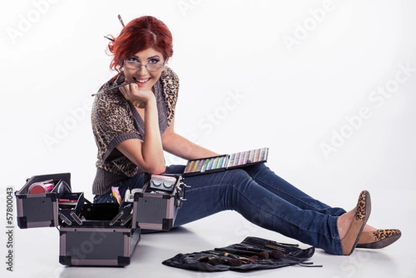 Obraz Happy make-up artist surrounded by her tools