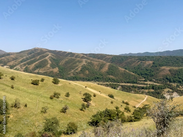 Fototapeta The foothills in Pamir are green all year round.