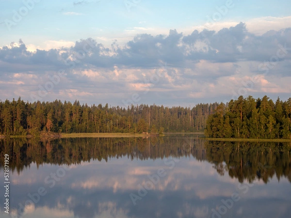 Fototapeta landscape with reflections on a forest lake