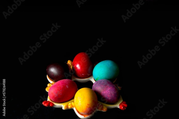 Obraz Colored easter eggs on a black background