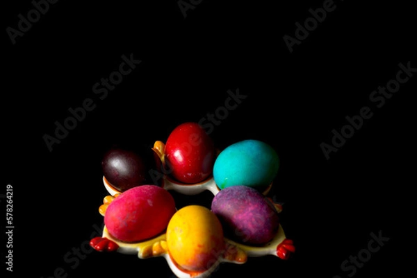 Obraz Colored easter eggs on a black background