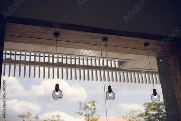 Fototapeta Lamp hanging in front of a coffee shop for decoration