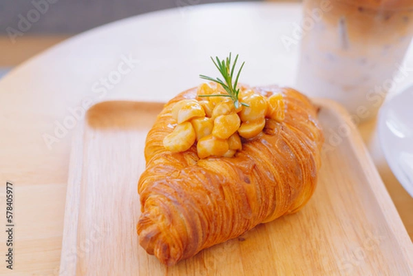 Fototapeta Croissant Bakery homemade on the table breakfast tray with gold and crispy