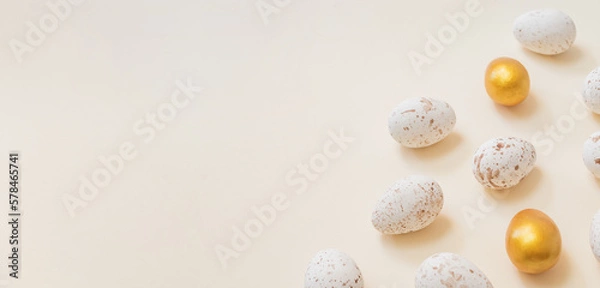 Fototapeta Easter composition with easter eggs on a beige background