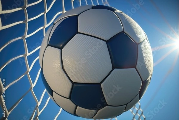 Fototapeta Close-up of a soccer ball going into the back of the net with a blue sky background. AI Generation