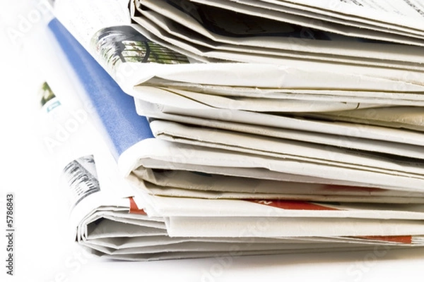Obraz Stack of newspapers on white background