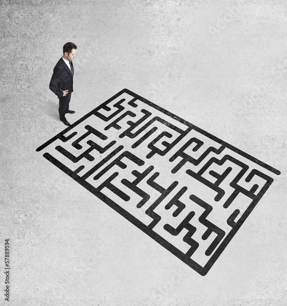 Fototapeta businessman looking at maze