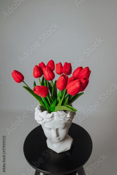 Obraz a bouquet of red tulips on a white background