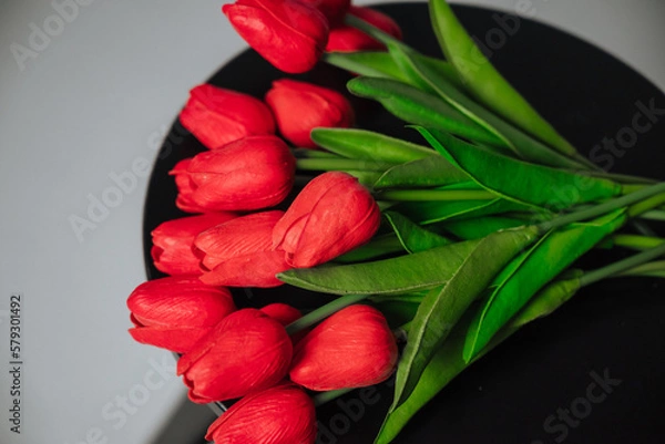 Obraz a bouquet of red tulips on a white background