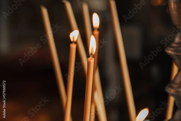Obraz lit candles in the temple close-up