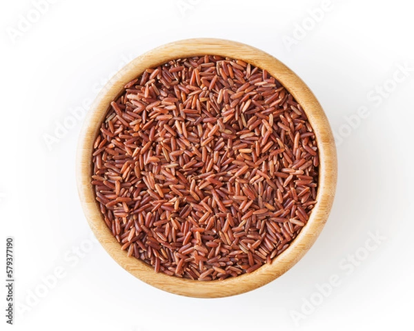 Obraz Uncooked red rice in wooden bowl isolated on white background with clipping path