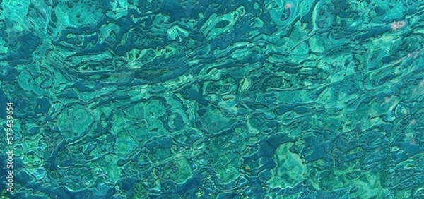 Obraz Azure ripples of shiny surface. Rippled shoal reflect of waters.Heavy sea seashore depth for background. Sunny liquid smooth сlean blink tide seaside. Deep vivid blue vintage relax beach view for swim