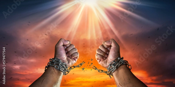 Fototapeta Hands in fists breaking a chain freedom. The concept of gaining freedom.