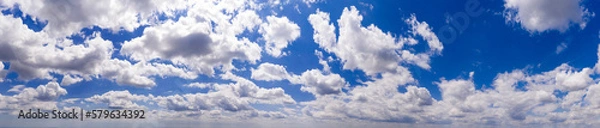 Fototapeta Panoramic view of blue sky with clouds and sunlight