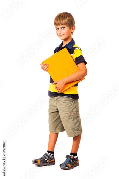 Fototapeta School boy is holding a book