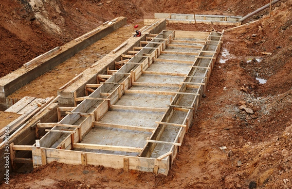Obraz Construction of an industrial building foundation pit