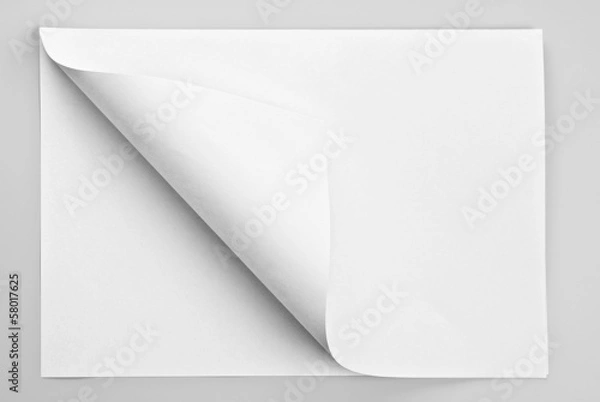 Fototapeta Folded sheet of paper with curled corner