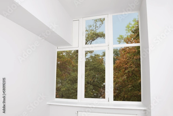 Fototapeta Empty office room with clean window. Interior design